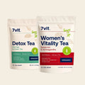 Two stand-up pouches of 7vit tea on a white background: Detox Tea with a green label and Women's Vitality Tea with a red label.